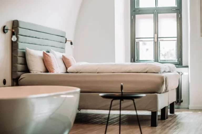 How Can You Create a Calm Bedroom Atmosphere Without Making It Feel Empty?
